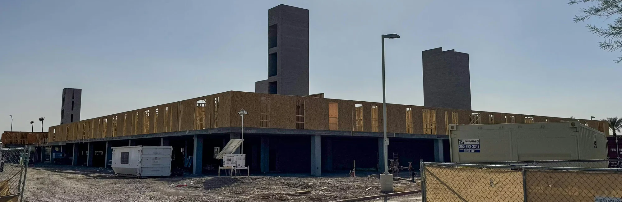 Traditional wood is used in framing for an apartment building. S.A. Miro, Inc.